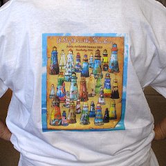T-shirt decorated w/ array of lighthouses on back